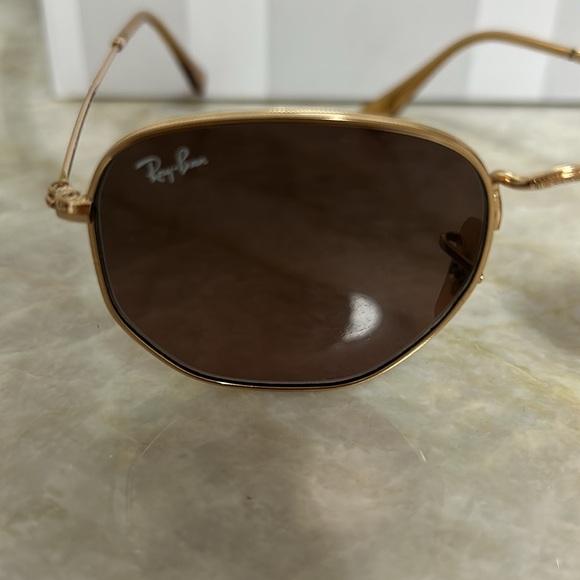 Ray Ban sunglasses.  Gold rims. main image 5